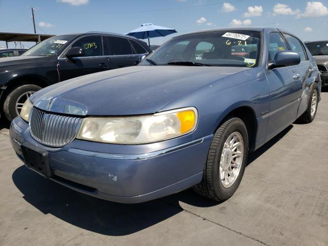 Photo 2 from auction – 2000 LINCOLN TOWN CAR E with VIN 1LNHM81W8YY788415