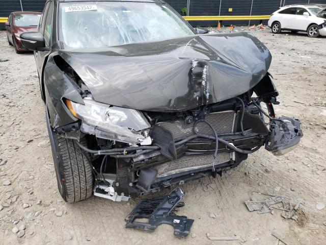 Photo 9 from auction – 2015 NISSAN ROGUE S with VIN 5N1AT2MV4FC821165