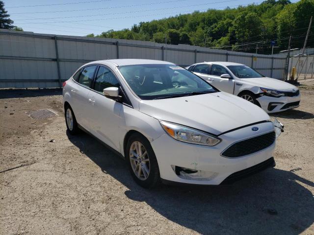 FORD FOCUS SE 2015 with VIN 1FADP3F21FL339838 - Photo from auction