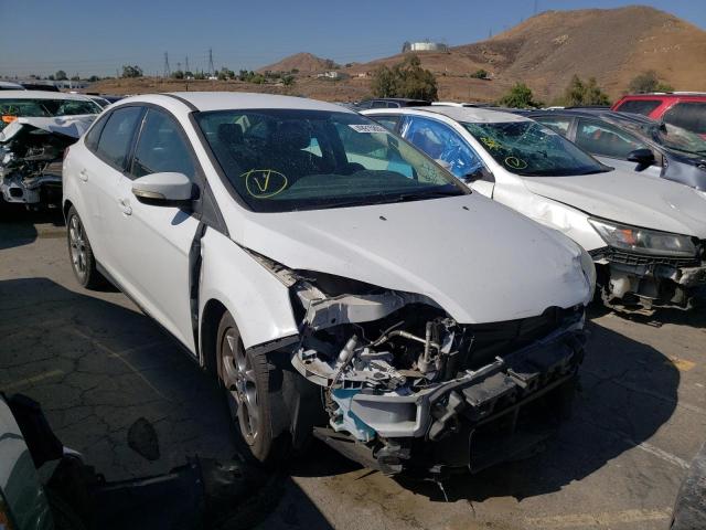 FORD FOCUS SE 2014 with VIN 1FADP3F25EL382299 - Photo from auction