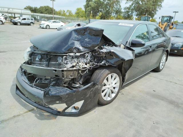 Photo 2 from auction – 2012 TOYOTA CAMRY HYBR with VIN 4T1BD1FK2CU020898