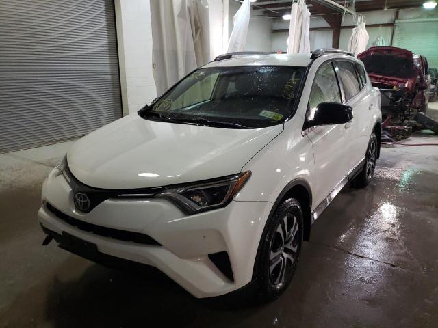 Photo 2 from auction – 2018 TOYOTA RAV4 LE with VIN JTMBFREV8JJ176192