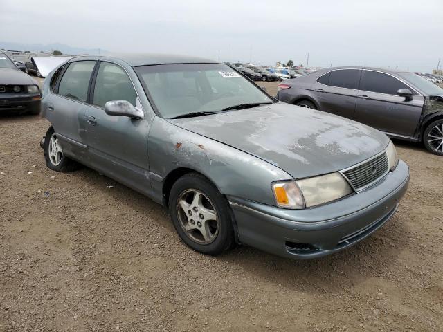 TOYOTA AVALON 1999 with VIN 4T1BF18B5XU302045 - Photo from auction