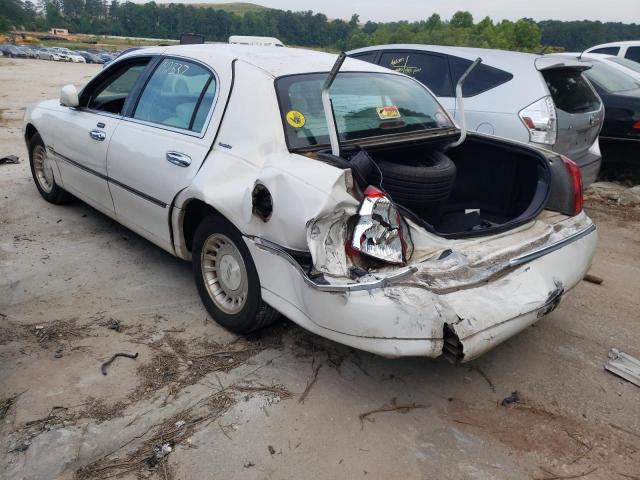 Photo 3 from auction – 2001 LINCOLN TOWN CAR E with VIN 1LNHM81W61Y630533