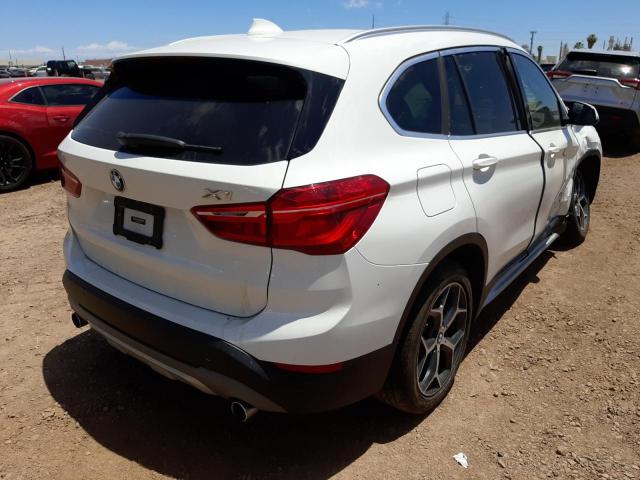 Photo 4 from auction – 2017 BMW X1 XDRIVE2 with VIN WBXHT3C35H5F72445