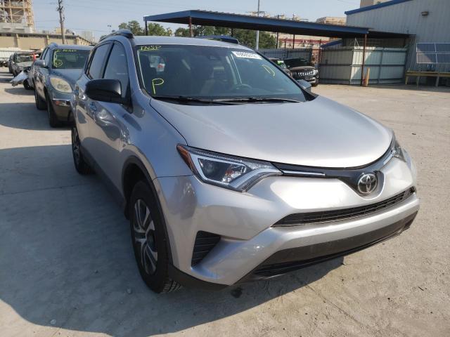TOYOTA RAV4 LE 2018 with VIN 2T3BFREV5JW784964 - Photo from auction