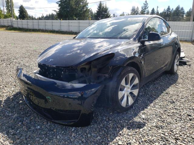Photo 2 from auction – 2021 TESLA MODEL Y with VIN 5YJYGAEE1MF304597