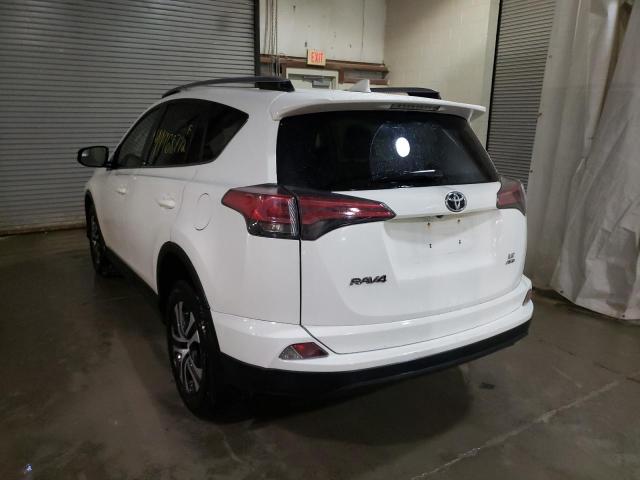 Photo 3 from auction – 2018 TOYOTA RAV4 LE with VIN JTMBFREV8JJ176192