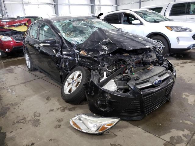 FORD FOCUS SE 2014 مع رقم تعريف المركبة 1FADP3F27EL391117 - صورة من المزاد