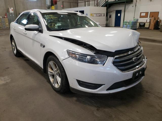 FORD TAURUS SEL 2014 with VIN 1FAHP2H89EG164551 - Photo from auction