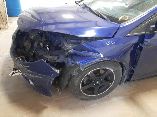 Foto 9 de la subasta – 2012 FORD FOCUS SE con VIN 1FAHP3K27CL319273