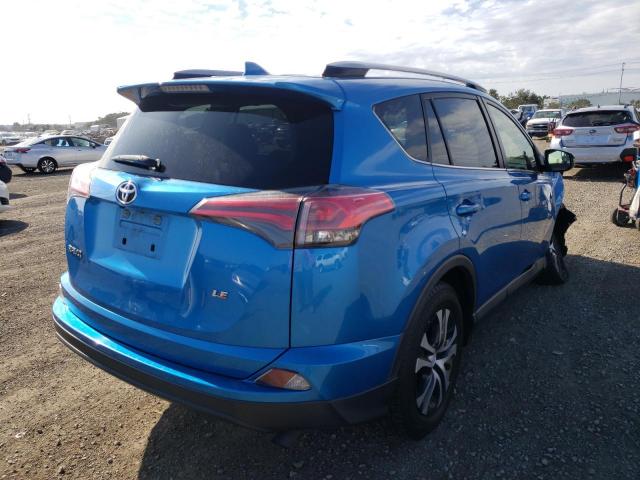 Photo 4 from auction – 2017 TOYOTA RAV4 LE with VIN JTMZFREV5HJ115035