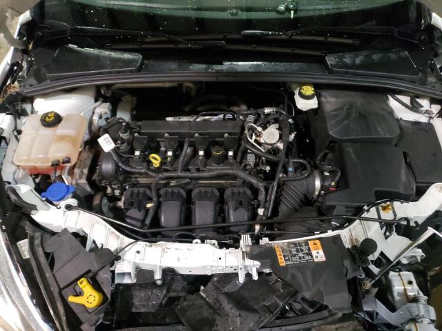 Foto 7 de la subasta – 2017 FORD FOCUS SE con VIN 1FADP3F27HL250911