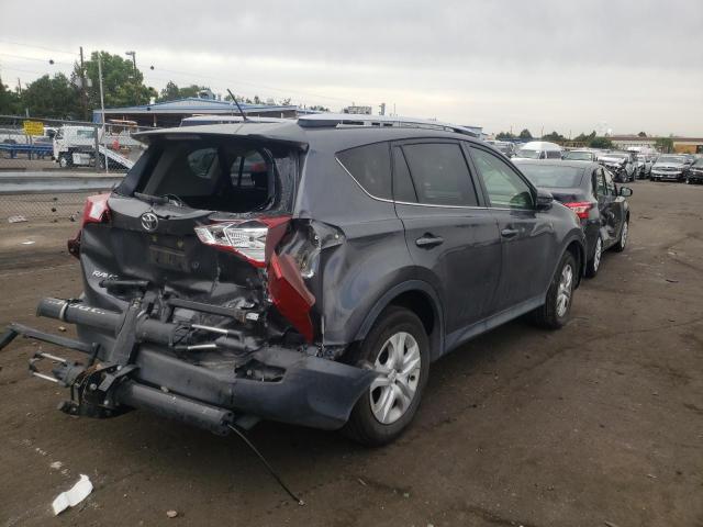 Photo 4 from auction – 2014 TOYOTA RAV4 LE with VIN JTMZFREV4ED036854