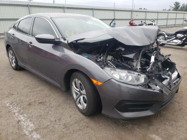 HONDA CIVIC LX 2018 with VIN 2HGFC2F57JH569507 - Photo from auction