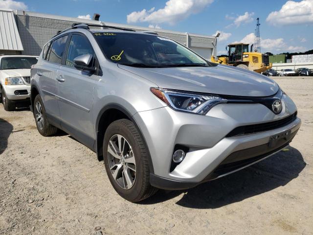 TOYOTA RAV4 ADVEN 2018 with VIN 2T3RFREV3JW744493 - Photo from auction