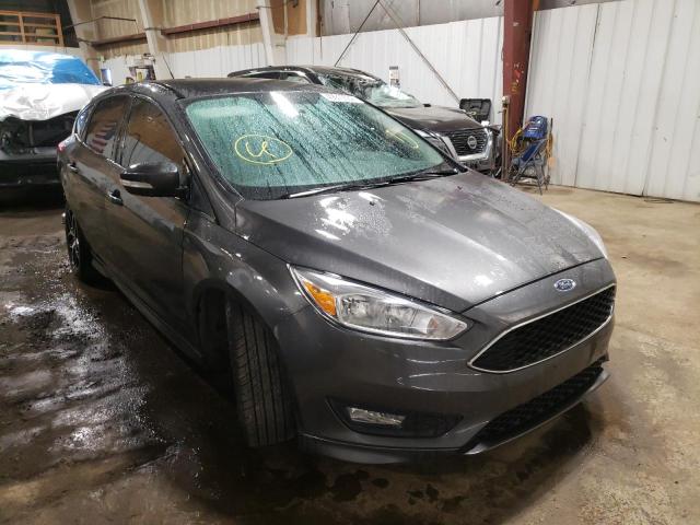 FORD FOCUS SE 2015 with VIN 1FADP3K23FL275498 - Photo from auction