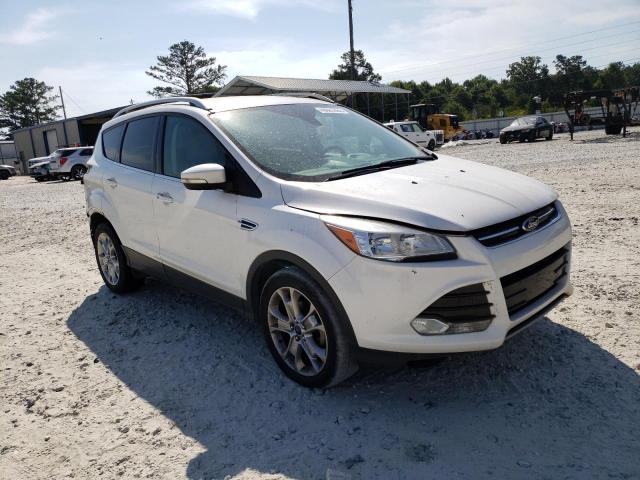 FORD ESCAPE TIT 2016 with VIN 1FMCU0JX9GUA25863 - Photo from auction