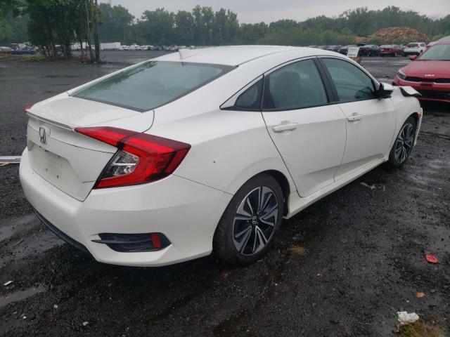 Photo 4 from auction – 2018 HONDA CIVIC EX with VIN 19XFC1F81JE201418