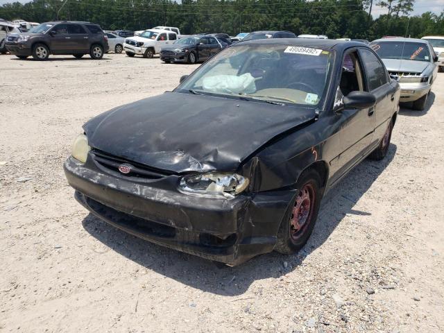 Photo 2 from auction – 2000 KIA SEPHIA BAS with VIN KNAFB1216Y5846211
