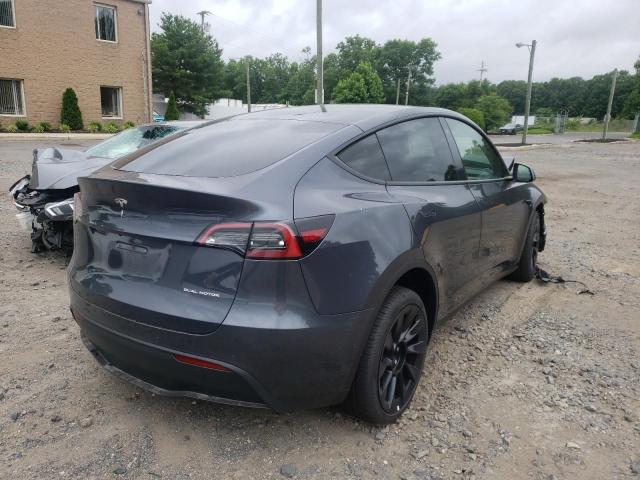 Photo 4 from auction – 2022 TESLA MODEL Y with VIN 7SAYGDEE4NF386671