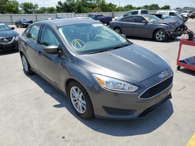 FORD FOCUS SE 2018 with VIN 1FADP3F21JL268875 - Photo from auction