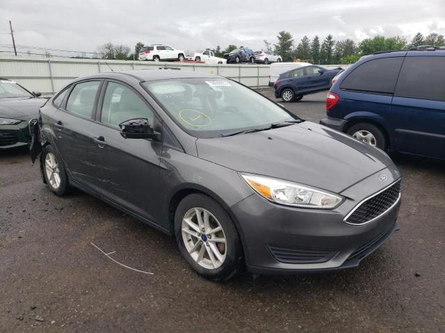 FORD FOCUS SE 2015 with VIN 1FADP3F21FL227069 - Photo from auction