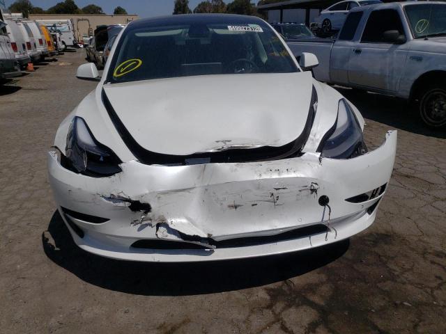 Photo 9 from auction – 2022 TESLA MODEL 3 with VIN 5YJ3E1EA8NF188667