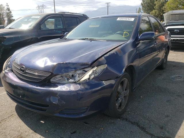Photo 2 from auction – 2002 TOYOTA CAMRY LE with VIN 4T1BF30K12U514599