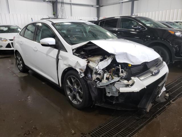 FORD FOCUS SE 2014 with VIN 1FADP3F21EL206902 - Photo from auction