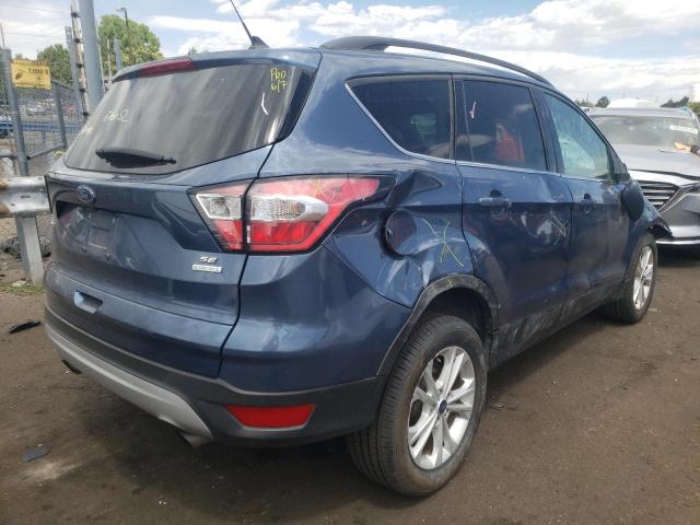 Photo 4 from auction – 2018 FORD ESCAPE SE with VIN 1FMCU0GD8JUC04514