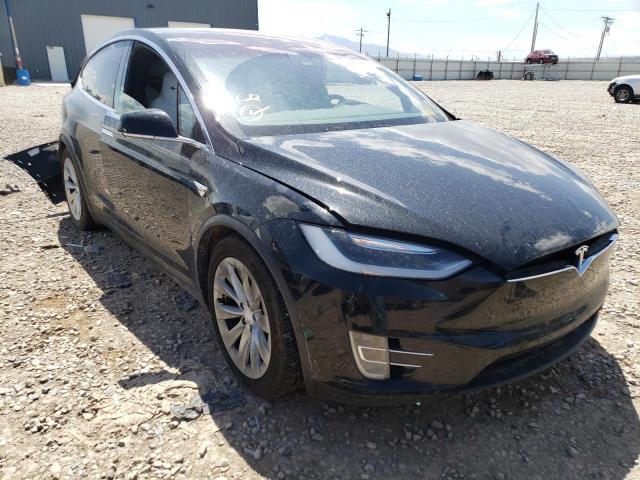 TESLA MODEL X 2017 with VIN 5YJXCBE23HF055261 - Photo from auction