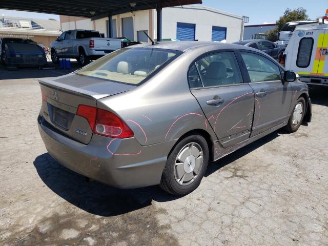 Photo 4 from auction – 2006 HONDA CIVIC HYBR with VIN JHMFA36206S004045
