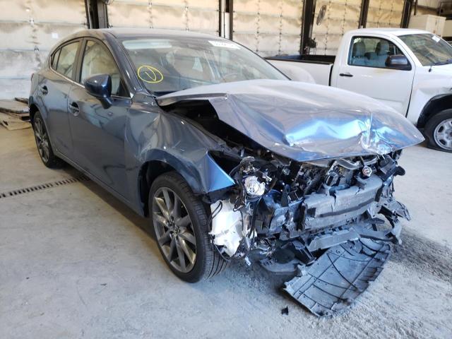 MAZDA 3 TOURING 2018 with VIN 3MZBN1L31JM262580 - Photo from auction