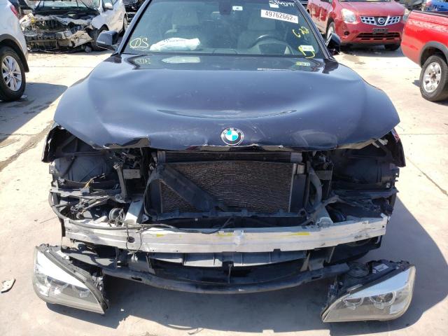 Photo 9 from auction – 2014 BMW 740 I with VIN WBAYA6C53ED144276