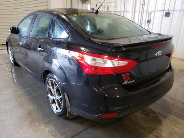 Foto 3 de la subasta – 2014 FORD FOCUS SE con VIN 1FADP3F21EL241665