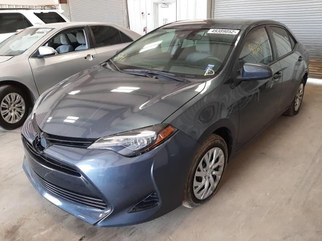 Photo 2 from auction – 2018 TOYOTA COROLLA L with VIN 5YFBURHE1JP809791