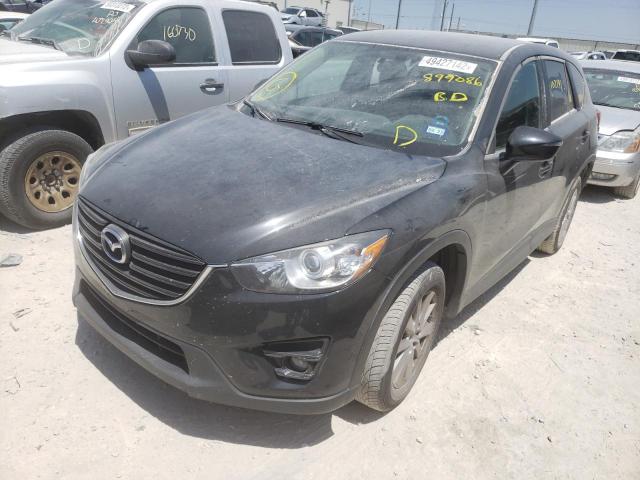 Photo 2 from auction – 2016 MAZDA CX-5 TOURI with VIN JM3KE2CY1G0899086