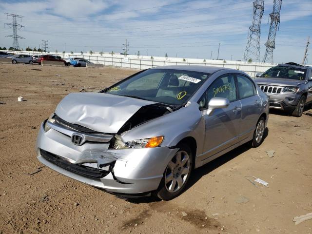 Photo 2 from auction – 2011 HONDA CIVIC LX with VIN 19XFA1F5XBE002297