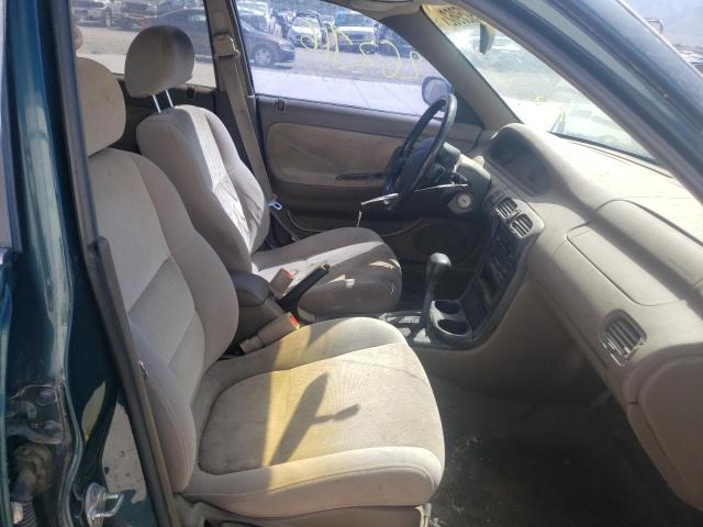 Photo 5 from auction – 1996 MAZDA 626 DX with VIN 1YVGE22C4T5582043
