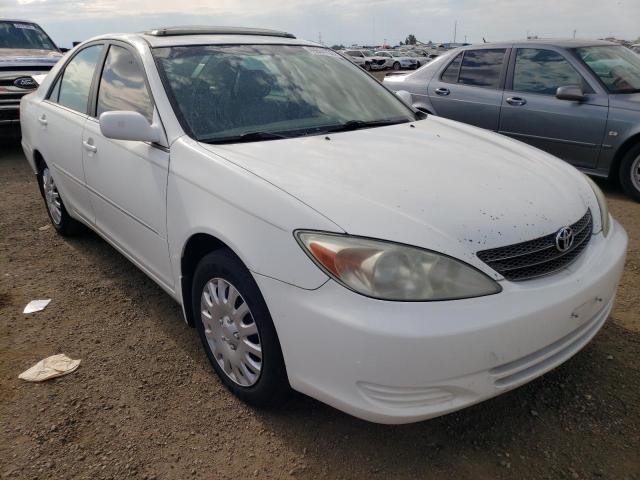 TOYOTA CAMRY LE 2002 with VIN 4T1BE32KX2U048882 - Photo from auction