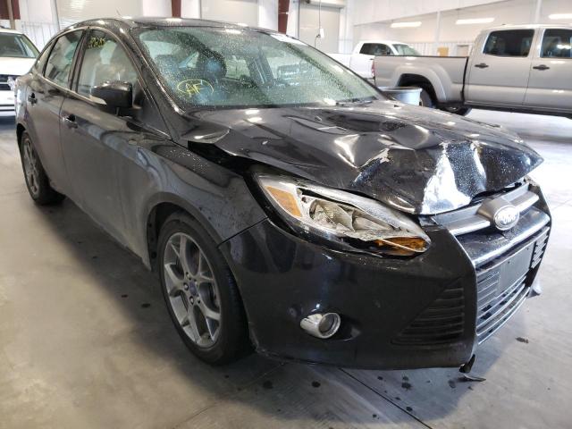 FORD FOCUS SE 2014 con VIN 1FADP3F21EL241665 - Foto de la subasta