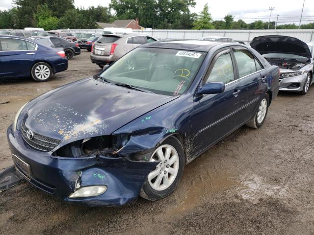 Photo 2 from auction – 2003 TOYOTA CAMRY LE with VIN 4T1BE30K73U161452