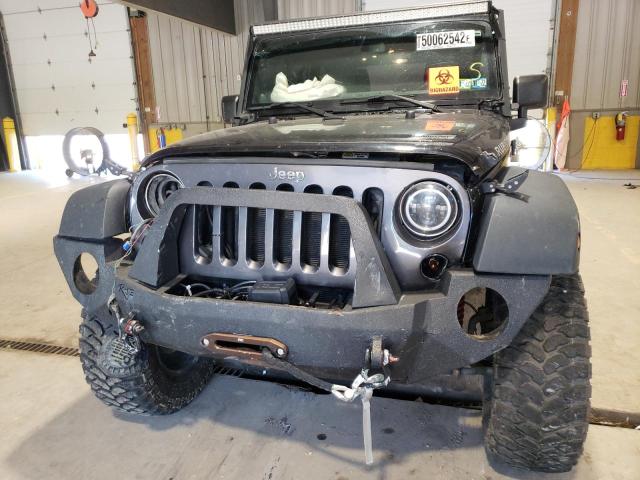 Photo 9 from auction – 2014 JEEP WRANGLER U with VIN 1C4BJWFG5EL108682