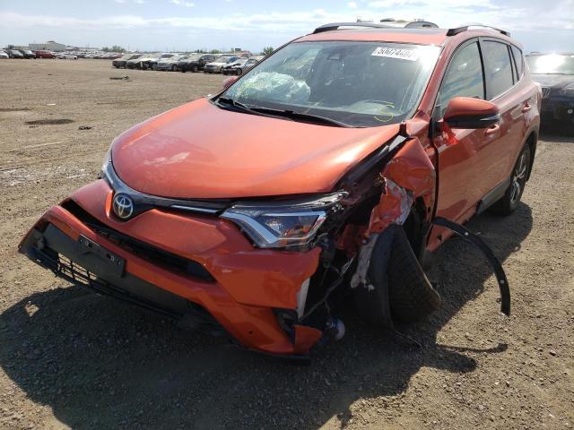 Photo 2 from auction – 2016 TOYOTA RAV4 XLE with VIN JTMRFREV5GJ094475