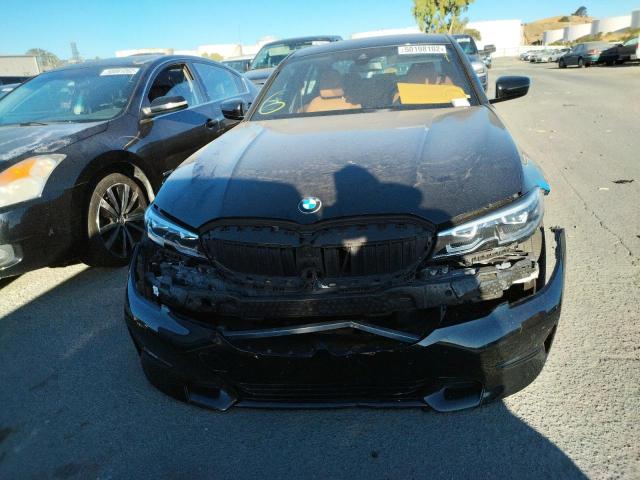 Photo 9 from auction – 2021 BMW 330I with VIN 3MW5R1J04M8B77756