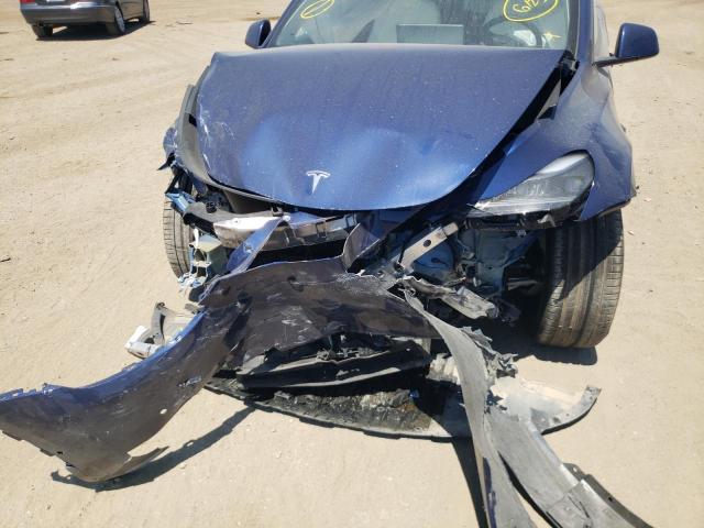 Photo 9 from auction – 2021 TESLA MODEL Y with VIN 5YJYGDEF5MF134075
