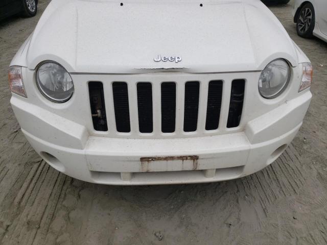 Photo 9 from auction – 2010 JEEP COMPASS SP with VIN 1J4NF4FB9AD636201