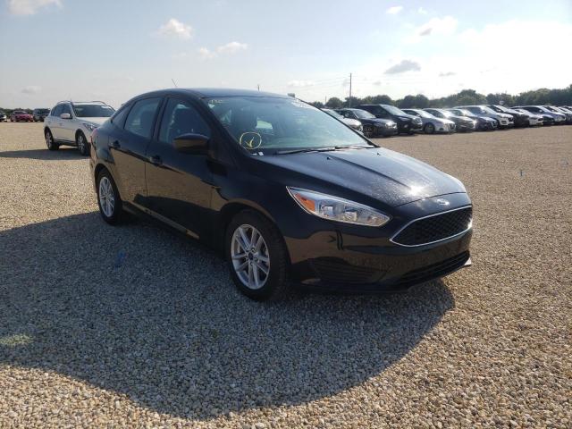 FORD FOCUS SE 2018 with VIN 1FADP3F21JL299284 - Photo from auction