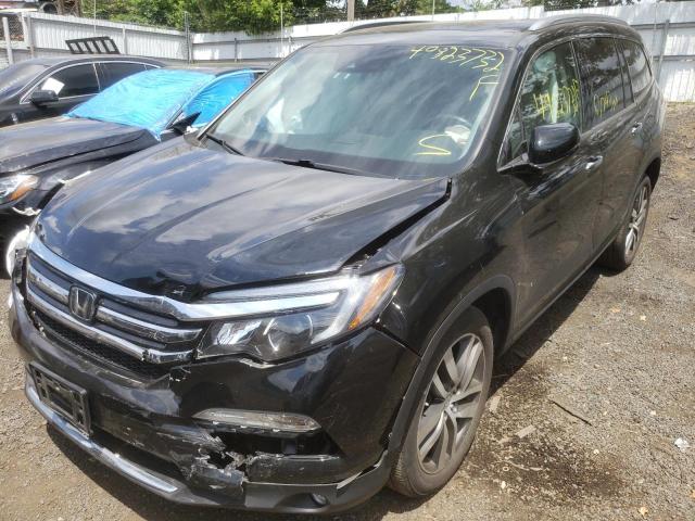 Photo 2 from auction – 2016 HONDA PILOT TOUR with VIN 5FNYF6H96GB016089